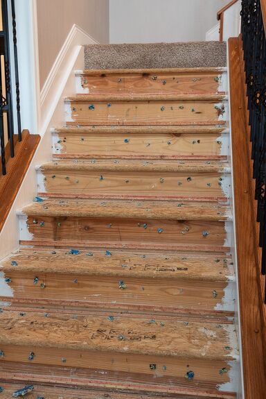 a set of stairs that are covered in wood planks