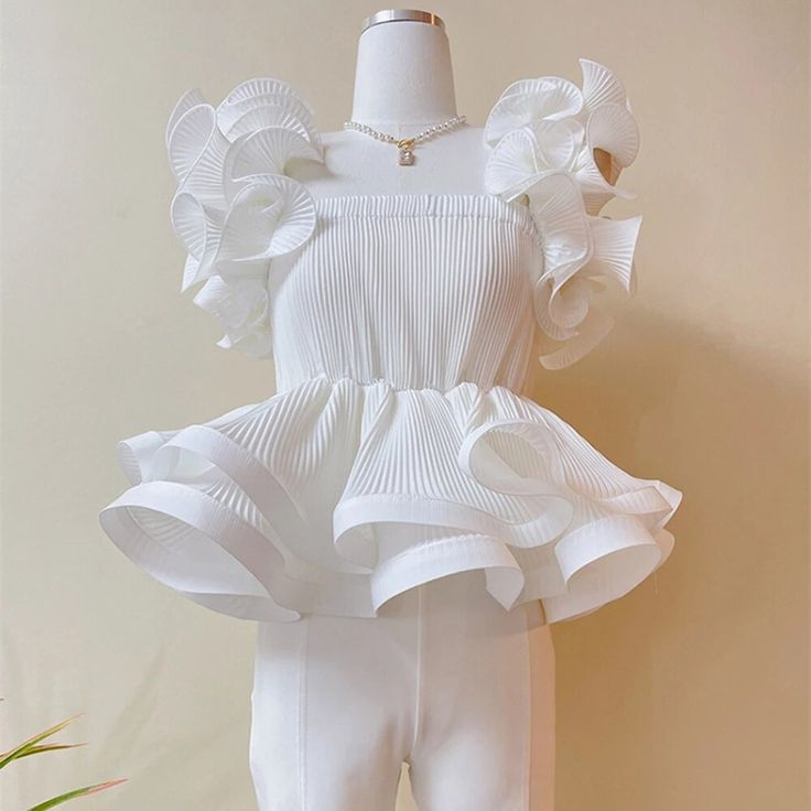 This is perfect for those who are looking for a clothing for a good price. It is fashionable, stylish, and it will look great on anyone who wears it. Do you wanahavit? SIZE Bust:70-114cm Waist:66-122cm Length:39cm Note: 1 inch = 2.54 cm, 1 cm = 0.39 inch note: measurement by hands allow 2-4cm errors which is normal Chic White Non-stretch Blouse, White Non-stretch Spring Blouse, Non-stretch White Blouse For Spring, Summer Stretch Blouse In Solid Color, Elegant White Solid Color Blouse, White Solid Color Top For Party, Trendy White Non-stretch Tops, White Non-stretch Party Blouse, White Non-stretch Trendy Tops