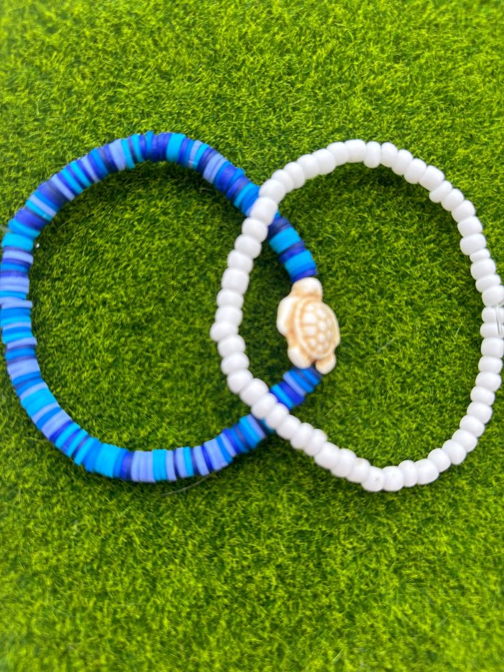 A Preppy Blue Turtle Bracelet Set that you can give as gifts or keep! Adjustable Blue Jewelry For Vacation, Handmade Blue Jewelry For Beach Season, Blue Beaded Beachy Jewelry, Blue Strand Jewelry For Friendship, Bohemian Blue Stretch Bracelet For Summer, Blue Bohemian Stretch Bracelet For Summer, Adjustable Blue Jewelry For Beach, Adjustable Blue Beach Jewelry, Blue Beachy Jewelry For Vacation