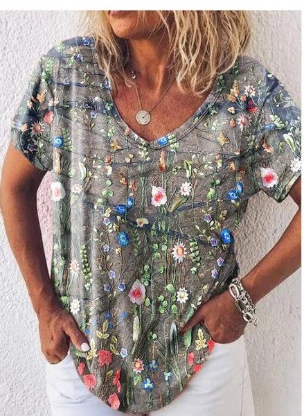 Product Title :Floral Loose Casual T-ShirtSize Guide (CM)  Tag size US Waist Length Shoulder Bust   S   64 50 106   M   65.5 51 110   L   67 52.6 116   XL   68.5 54.2...