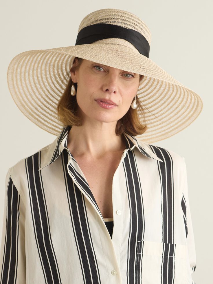 Eugenia Kim's 'Mirabel' sunhat is woven from straw in an airy, open construction and finished by hand in the designer's NYC studio. It's wrapped with black grosgrain ribbon around the crown and has an exaggerated brim that's perfect for shading your face during tropical vacations. Tropical Vacations, Nyc Studio, Anita Ko, Dress Flats, Eugenia Kim, Jo Malone London, Beauty Sets, Ski Wear, Everyday Wardrobe