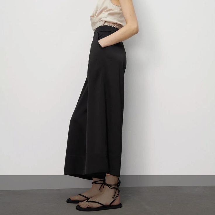 High-Waisted Pants With Elastic Waistband. Front Pockets And Back False Welt Pockets. Full Waist 30” And Beyond. Length 36” Inseam 22” Rise 14” Chic Culottes With Loosely Fitted Hips, Chic Non-stretch High-waisted Wide Leg Pants, Chic Solid Color Wide-leg Pants, Versatile Wide Leg Spring Dress Pants, Spring Wide Leg Versatile Dress Pants, Spring Wide Leg Dress Pants, Versatile Wide-leg Spring Dress Pants, Black Summer Ankle-length Culottes, Elegant Bottoms For Night Out In Summer