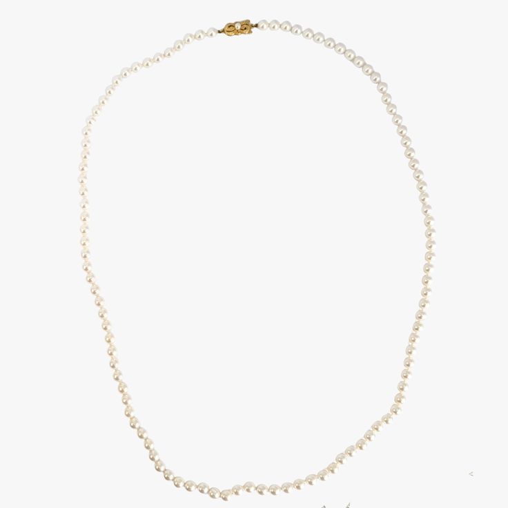 This is a truly exceptional piece - an genuine vintage MIKIMOTO Japanese Akoya pearl necklace with an 18K yellow gold pearl clasp, adorned with the renowned Mikimoto trademark. The necklace is a classic, timeless design that is sure to be treasured for generations to come. Measuring 32" (81cm) in length and weighing 47.8 g, the necklace is made up of high-quality cultured Akoya pearls farmed in Japan. The pearls are 7.0 to 7.5 mm in size and exhibit a stunning white color with pink and green ove Fine Pearl Jewelry, Akoya Pearl Necklace, Pearl Clasp, Pearl Farm, Mikimoto Pearls, Akoya Pearls, Gold Pearl, Pearl Jewelry, White Color