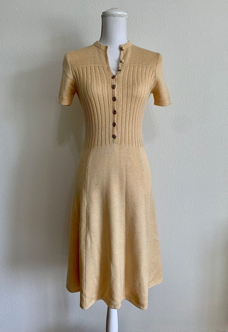 "vintage St. John knit dress gold brand initial buttons round neck A-line skirt classy lady style gorgeous and classy outfit, just timeless! tag: St. John Knits/USA made size: US 2/XS material: knit measurements: shoulder to shoulder-13.25\" arm pit to arm pit-15\" arm length-7.5\" waist-12.75 total length-41\" condition: good vintage, some active pilings(please see pictures) *AS ALWAYS, GUARENTEED AUTHENTIC! please let me know of any questions. Thank you." Elegant A-line Vintage Dress With Buttons, Classic A-line Vintage Dress With Button Closure, Classic A-line Vintage Dress With Buttons, Elegant Fitted Dresses With Gold Buttons, Classic Fitted A-line Vintage Dress, Fitted A-line Vintage Dress With Buttons, Classic Knee-length Vintage Dress, Classic Vintage Midi Dress With Buttons, Elegant Vintage Midi-length Dress With Buttons