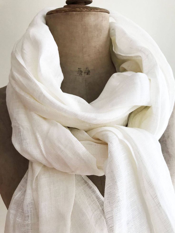 "Lovely, gauzy, lightweight white linen scarf in a generous size. Wonderful linen texture, natural wrinkles. Made from high quality 100% European linen. Edges are frayed for more casual look and fixed to prevent further fraying. A great item in your wardrobe that will be joy to wear in summer as well as in winter. Dimensions: approximately 29.5\" x 78.7\" [75 x 200 cm] Care instructions: - gentle wash cycle - preferably lukewarm water - straighten and hang to dry - It will become softer with eve Classic White Scarf For Gift, Shawl For Men, Linen Shawl, Big Scarf, Linen Scarf, White Scarf, Linen Scarves, White Scarves, Linen White