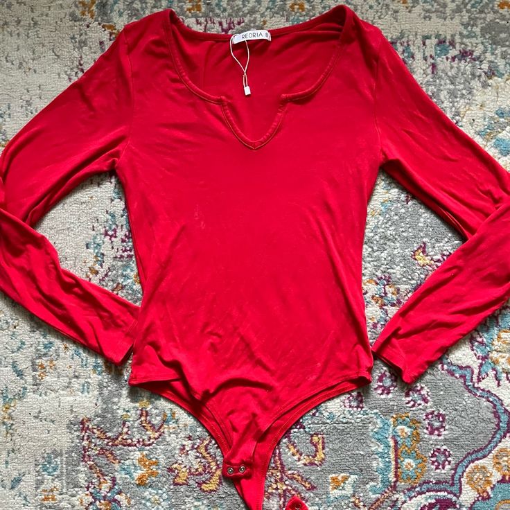 Brand New; Runs A Bit Big Red V-neck Bodysuit For Spring, Spring Red V-neck Bodysuit, Trendy Red Long Sleeve Bodysuit, Red Casual Bodysuit For Spring, Casual Red Bodysuit For Spring, Chic Red Bodysuit For Spring, Red Casual Bodysuit For Night Out, Casual Red Bodysuit For Night Out, Red Bodysuit For Night Out In Spring