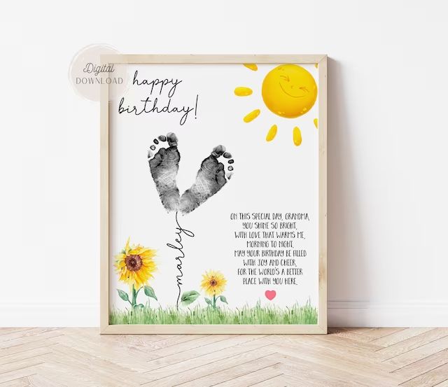 a happy birthday card with two feet and sunflowers