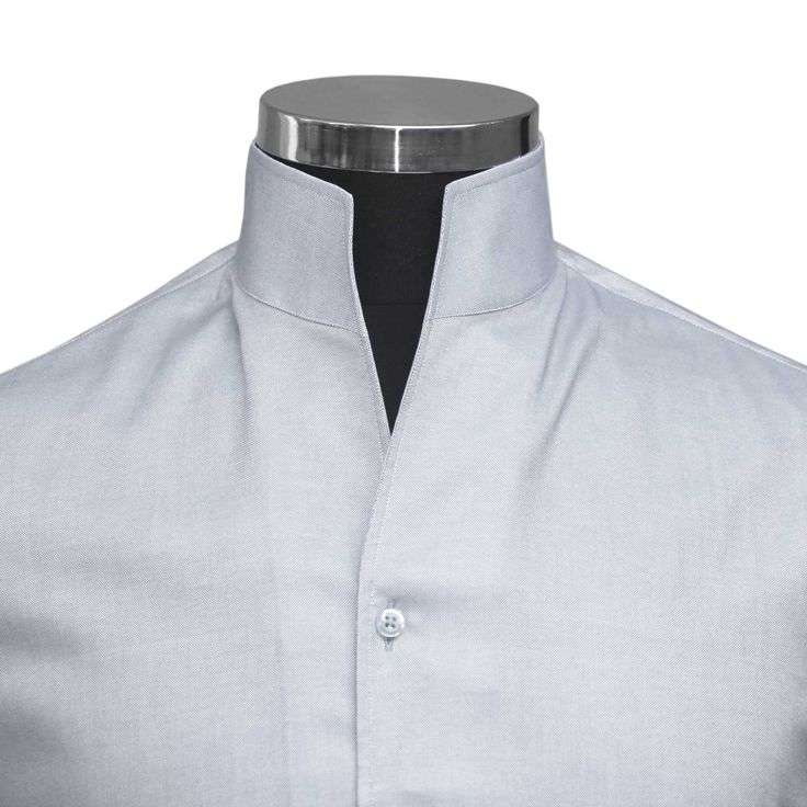 "Men's High Open V Collar Grey 100% Cotton Long Sleeves Dress Shirt MADE-TO-ORDER CLOTHES Shirt Style: Karl Lagerfeld Style/ High Chinese Mandarin Collar/ High Open V Collar Collar Style: 3\" High Stiff Buttonless Collar Pockets: Without pocket (Chest pocket can be added on request) Fabric: 100% Giza cotton soft & comfortable fabric Sleeves: Full Sleeves/ Long Sleeves Fine stitched (20-21 stitches per inch) Cleanly finished buttonholes Flat Felled Seams Hand cut and sewed individually High-quality tailoring Savile Row / British style collar Cuff: 4\" wide single cuff, with 3 buttons These shirts are made with a single cuff. For the double cuff, please leave us a message. * The shirts are made on order in our family-run workshop. Thus we take this long to ship. Every piece is individually h Male Closet, Mens High Collar Shirts, Karl Lagerfeld Style, Karl Lagerfeld Fashion, Casual Grooms, High Collar Shirts, Open Collar Shirt, Chinese Mandarin, Long Sleeve Cotton Dress