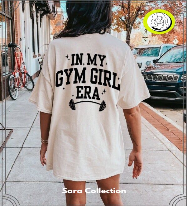 Chic and Functional Women's Gym Outfits for Every Workout Shirts With Words On The Back, Photo T Shirt Design, Baddie Tshirt Design Ideas, Workout Shirt Designs, Gym Tshirt Design Graphic Tees, Fitness T Shirts Design, Workout Tshirt Design, Fitness Tshirt Design Gym, Workout Shirt Ideas