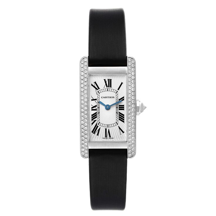 Cartier Tank Americaine White Gold Diamond Ladies Watch WB701851. Quartz movement. 18K white gold case 19.0 x 35.0 mm with original Cartier factory 2 rows of diamond on the sides. Circular grained crown set with faceted diamond. . Scratch resistant sapphire crystal. Silver guilloche dial with black roman numerals. Sword shape blue steel hands. Secret Cartier signature at X. Black silk strap with 18k white gold deployant buckle. Formal Black Diamond Watch With Diamond Accents, Formal Black Diamond Watch, Formal Black Diamond Accented Watch, Black Formal Watches With Diamond Accents, Black Watches With Diamond Accents For Formal Occasions, Formal Black Watches With Diamond Accents, Black Diamond Evening Watch, Cartier Timeless Diamond Evening Watch, Timeless Cartier Diamond Watch For Evening