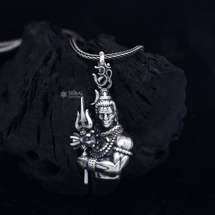 Metal-sterling silver. Item type-maha deva pendant Weight-10.44grams. Length-4cm, Width-1.8cm.  Finish-Oxidized. chain width-1.5mm(if buy) Weight-12.500 to 18.500 grams(weight vari as per length) Chain type-screw chain. Silver Amulet Necklaces For Puja, Sterling Silver Engraved Jewelry For Puja, Sterling Silver Necklaces With Oxidized Finish For Puja, Engraved Sterling Silver Jewelry For Puja, Sterling Silver Pendant For Puja, Sterling Silver Amulet Necklaces For Puja, Sterling Silver Amulet Necklace For Puja, Sterling Silver Temple Jewelry For Meditation, Silver Pendant Necklaces For Puja