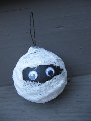 a black and white ball with eyes on it