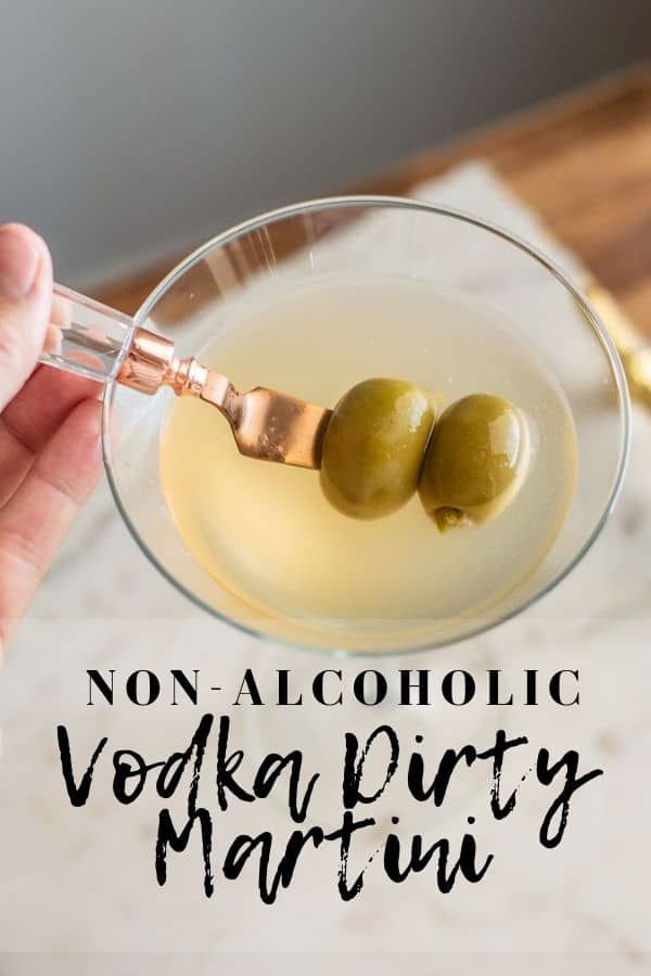 two olives in a martini glass with the words non alcoholic vodka party martini on it