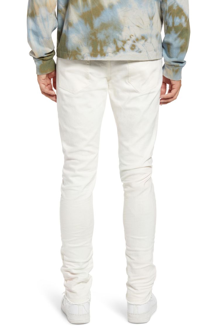 Crisp white Japanese-denim jeans are cut in a skinny fit with a hint of stretch that allows you to move freely and comfortably in these five-pocket jeans. 32 1/2" inseam; 13" leg opening; 10 1/2" front rise; 14" back rise (size 32) Zip fly with button closure Five-pocket style 98% cotton, 2% polyurethane Machine wash, line dry Made in Japan Men's Clothing White Bottoms With Standard Cut Leg For Fall, White Bottoms For Fall With Standard Cut Leg, White Bottoms For Fall, Classic White Jeans With Standard Cut Leg, Fitted White Jeans With Five Pockets, Fitted White Jeans For Fall, White Fitted Jeans For Fall, White Pants With Five Pockets Standard Cut, White Five-pocket Jeans For Fall