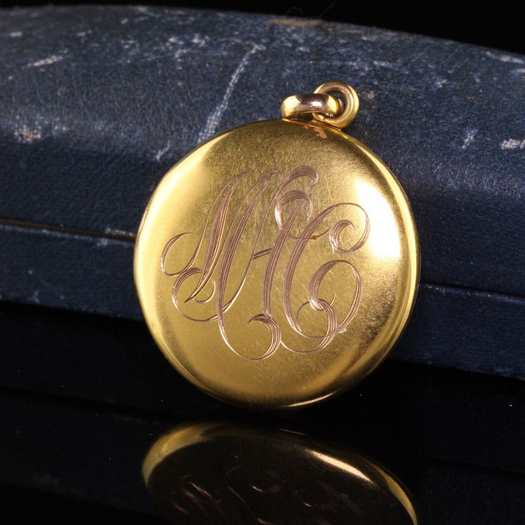 Beautiful Antique Victorian 10K Yellow Gold Engraved Locket Pendant. This classic locket is crafted in 14k yellow gold. The locket is plain and has an engraving of the previous owners initials on one side. A very beautiful and classic locket. Item #N0089 Metal: 10K Yellow Gold Weight: 7.8 Grams Size: 1 inch in diameter Measurements: The pendant is 1 inch in diameter and 5.52 mm deep. Layaway: For your convenience, we will be happy to provide layaway payment options. Please contact us to work out 14k Yellow Gold Locket Necklace For Anniversary, Classic Monogram Medallion Jewelry, Engraved 14k Rose Gold Locket Necklace, Gold Monogram Medallion Jewelry, Engraved Rose Gold Heirloom Locket Necklace, Classic 14k Gold Locket Necklace Keepsake, Classic 14k Gold Locket Necklace For Keepsake, 14k Gold Engraved Locket Necklace Gift, Elegant Hallmarked Locket Necklace For Formal Occasions