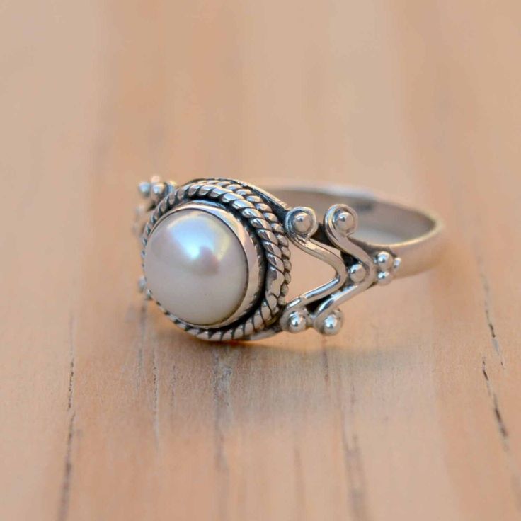 Sterling Silver Pearl Ring For Anniversary, Wedding Pearl Ring In Sterling Silver, Classic Sterling Silver Moonstone Wedding Ring, Sterling Silver Solitaire Pearl Ring For Anniversary, Elegant Silver Stackable Opal Ring, Wedding Pearl Ring Stamped 925 In Sterling Silver, White Sterling Silver Rings With Round Stone, Sterling Silver White Birthstone Rings, Silver Solitaire Pearl Promise Ring