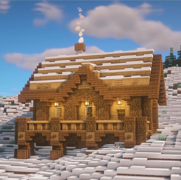 a house made out of logs and snow