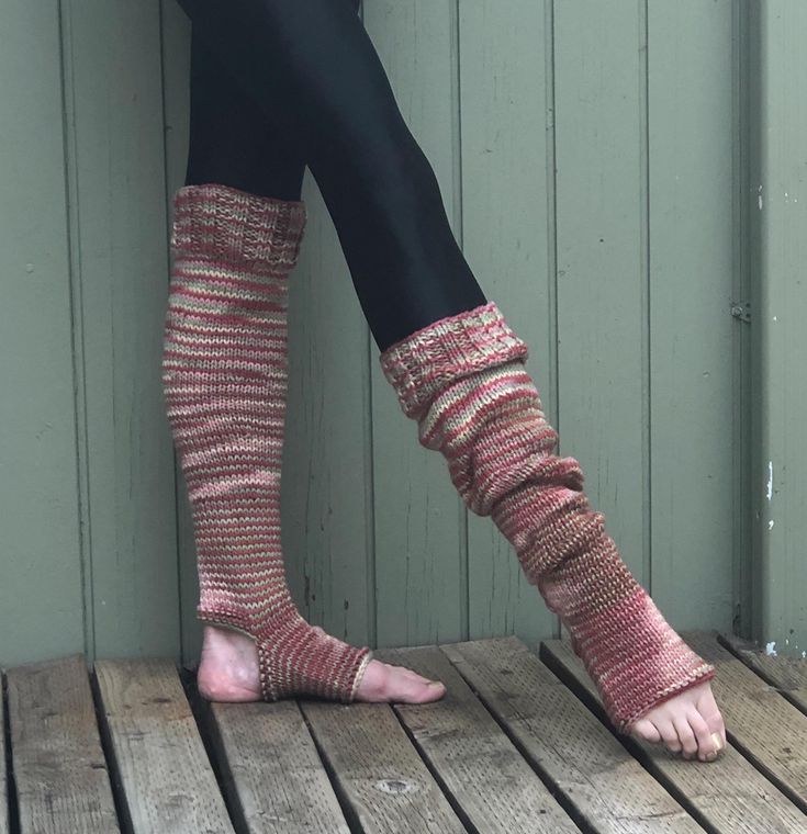 These hand knit stirrup socks/leg warmers are perfect for yoga, Pilates or dance class. They will keep your feet and ankles warm, but leave your toes and heels open to grab the mat or floor. Perfect gift for your favorite yogi or dance teacher.   These great leg warmers are not just for your work out class.  You can wear them with your skinny jeans and boots or with a skirt and ballet flats.  Wear them pulled up above the knee or slouched from ankle to knee.  You can fold the top down or pull it Comfortable Flexible Socks For Pilates, Casual Stretch Socks For Pilates, Footless Winter Leg Warmers, Flexible Footless Winter Leg Warmers, Comfortable Footless Yoga Socks, One-size Footless Leg Warmers, One Size Footless Warm Leg Warmers, Comfortable Stretch Knitted Leg Warmers, Stretch Leg Warmers For Yoga In Winter