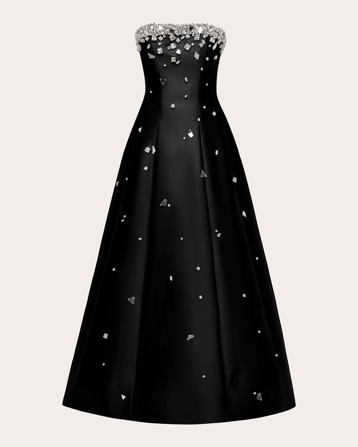 a black dress with white flowers on it