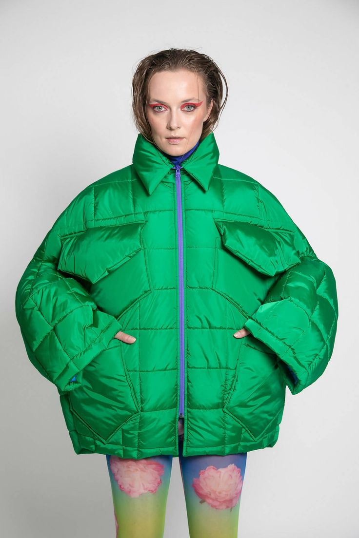 Unisex quilted jacket "Lupinus Green" features a round shoulder and oversized fit for a relaxed, comfortable feel. It's made from lightweight, wrinkle-free polyester and has large pockets, windproof, and water repellent properties. The soft, bold shape makes it a statement piece, and the hypoallergenic synthetic padding adds warmth without compromising style.Size Guide:ONE SIZE (fits to XS-XL)Collar - 51 cmWides middle line - 170 cmBottom line - 140 cmSleeve ends - 57 cmLength from the neckline Green Jacket, Wrinkle Free, Quilted Jacket, Water Repellent, Stella Mccartney, Size Guide, Collar, Green