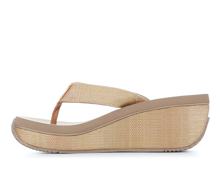 Woven synthetic upper with padded fabric lining, Easy slip-on entry, Approx. 2 3/4 inch wedge heel height, Approx. 1 1/2 inch platform height, Open round toe with fabric toe post, Woven wrapped midsole and durable rubber outsole, Cushioned foam insole, Volatile branding details | Women's Volatile Bahama Wedges Sandals in Tan Size 8 Summer Wedge Sandals With Arch Support For Vacation, Summer Vacation Sandals With Arch Support, Adjustable Synthetic Wedge Sandals For Vacation, Spring Beach Wedge Sandals With Arch Support, Adjustable Summer Wedge Sandals With Removable Insole, Spring Vacation Wedge Sandals With Arch Support, Adjustable Synthetic Wedge Sandals For Summer Outings, Adjustable Synthetic Wedge Sandals For Summer, Adjustable Wedge Sandals For Summer Beach Outings