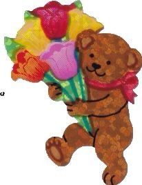 a brown teddy bear holding flowers in it's paws