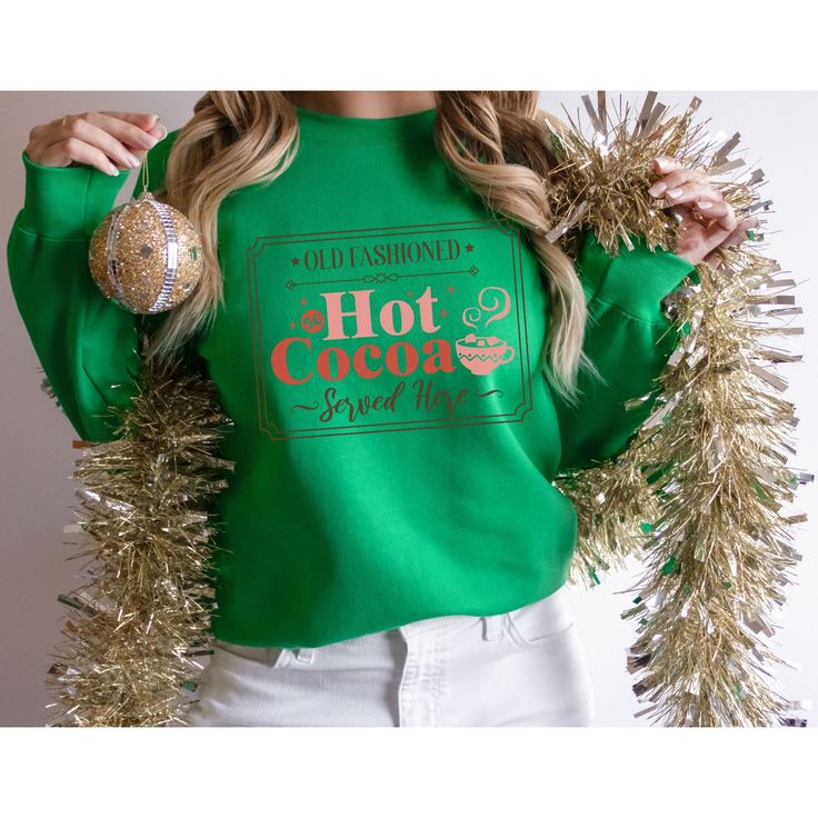 The Hot cocoa vintage sweatshirt is a great gift idea for those who love retro and holiday things! These sweatshirts are soft, light and warm, making them the perfect everyday staple. Cozy Crew Neck Sweatshirt As Gift, Red Winter Sweatshirt As Gift, Retro Winter Sweatshirt For Loungewear, Letter Print Sweatshirt Winter Gift, Green Winter Sweatshirt As Gift, Winter Graphic Print Sweater As Gift, Fall Graphic Print Sweater As A Gift, Cozy Long Sleeve Sweatshirt For Gift, Cozy Sweatshirt As A Gift