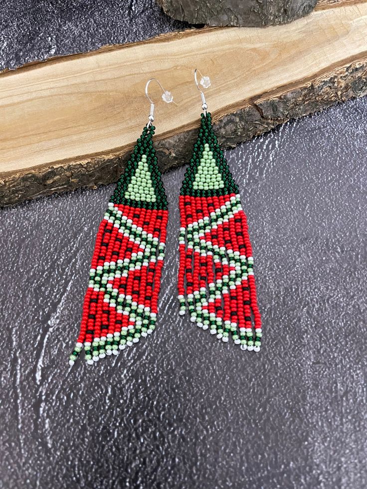 Beautiful long beaded earrings. Earrings with ornament. Earrings watermelon. Made from Czech beads Length 4.4inch (11.5cm) Width 1 inch (2.5cm) Hypoallergenic clasp. >Back to my shop: https://www.etsy.com/shop/jewelrybylarisa?ref=seller-platform-mcnav Beaded Long Drop Earrings As A Gift, Beaded Long Drop Earrings For Gifts, Traditional Dangle Beaded Earrings As Gift, Festive Dangle Earrings For Summer, Nickel-free Traditional Summer Jewelry, Traditional Long Drop Jewelry With Dangling Beads, Beaded Dangle Christmas Jewelry, Christmas Beaded Dangle Jewelry, Colorful Beads Long Drop Jewelry Gift