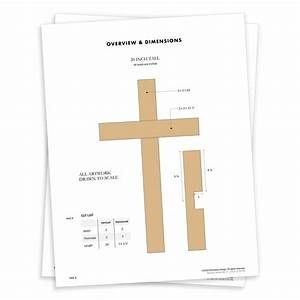 a cross is shown on top of a sheet of paper with measurements for each piece