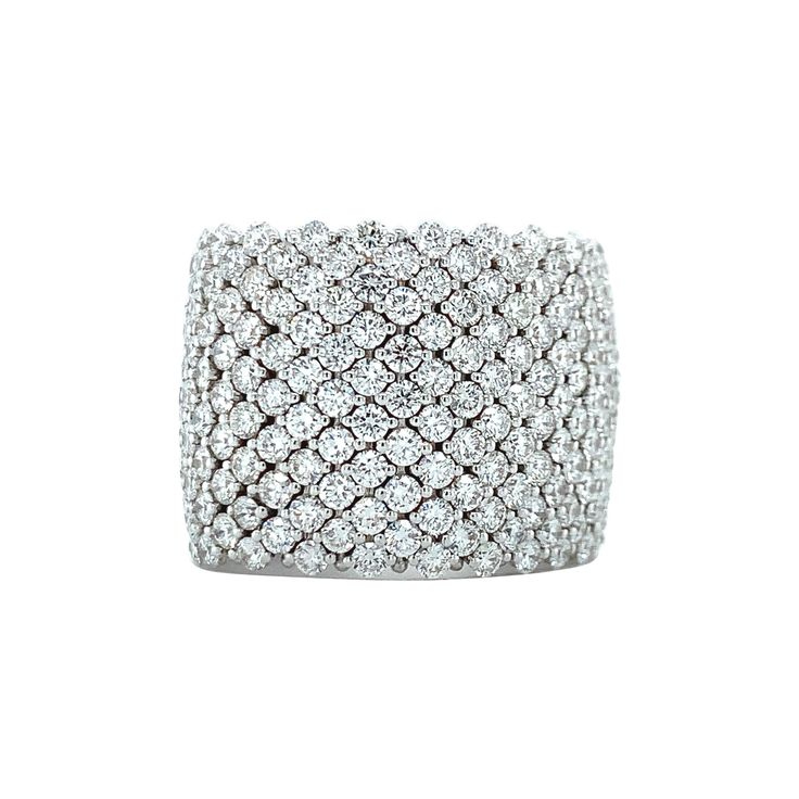 18K white gold classy band ring is from Dentelle Collection. This piece of jewellery is made from natural white diamonds in total of 7.37 Carat. Total metal weight is 20.60 gr. 1.8 cm wide. Great for any occasion! Dentelle Collection draws its inspiration from lace and its natural elegance presented through complex manufacturing techniques using white gold thread embroidered and diamonds. This combination captures and reflects the light recreating the hexagonal shapes of French lace. It is suppo Luxury Wide Band Diamond Ring With Diamond Cut, Luxury Wide Band Diamond White Diamond Ring, Luxury Diamond Wide Band Wedding Ring, Diamond White Diamond Ring With Wide Band And Accents, Fine Jewelry Diamond Wide Band Ring, Luxury Wide Band Diamond Cut Ring, Luxury Diamond Wide Band Ring With Round Cut, Dazzling Wide Band Diamond Ring, Luxury Wide Band Diamond Ring With Round Cut