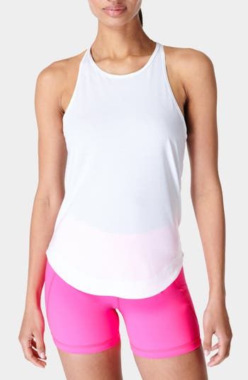 Move your body in this sporty knit tank crafted from sustainable fibers with a sleek racerback. 24" length (size Medium) Jewel neck 91% polyester, 9% elastane Machine wash, dry flat Imported Racerback Tank Top With Built-in Bra And 4-way Stretch, Sporty Stretch Tank Top With Built-in Bra, Athleisure Tank Top With Built-in Bra, Sporty Seamless T-back Tank Top, Sports Racerback Tank Top With Built-in Bra, Summer Tank Top With Built-in Bra For Light Exercise, Athleisure T-back Top For Training, Sports Tank Top With Built-in Bra And Minimal Stretch, Athleisure Tank Top With Built-in Bra For Training