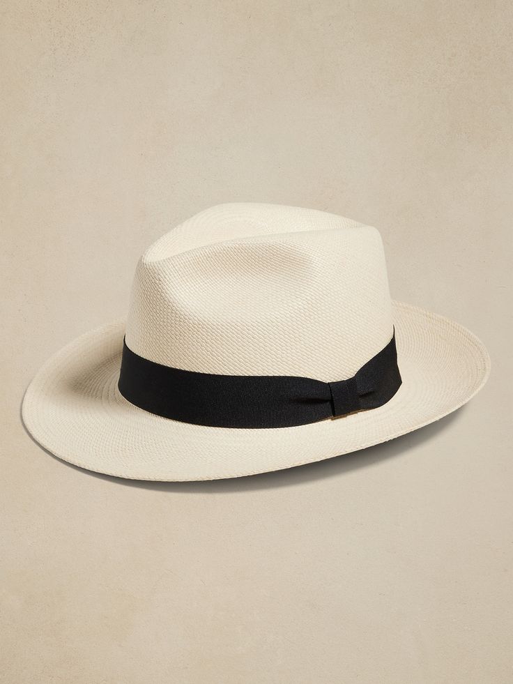 Hand-woven from Toquilla palm straw by expert artisans in Ecuador, this classically-styled Panama hat invites the wearer to make it their own, sporting only a simple black hatband.  Hampui: Rugged, yet always-refined, adventuresome Hampui hats are handcrafted from beautiful, sustainable materials that showcase the magic of the natural world.  Leather hatband and stampede strap.  Breathable cotton sweatband.  Brim Width: 4. 25" Crown Height: 4. 25" Small: 21. 7" (55cm) Medium: 22. 4" (57cm) Large Hat Styles, Hat Band, Sustainable Materials, Straw Hat, Natural World, Ecuador, Hat Fashion, Panama Hat, Panama