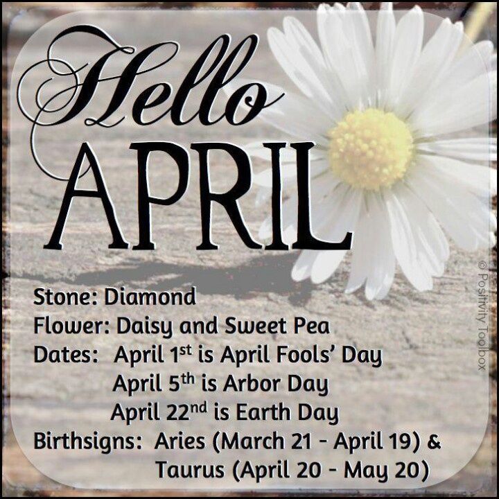 a white flower sitting on top of a sandy beach next to the words hello april