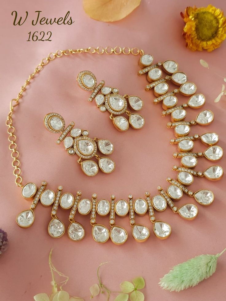 Pretty pachi kundan gold plated necklace set paired with  earrings  and mangtika handmade pachi kundan set intricately designed in meenakari with hydro pealrs which can be customise too Note : its made on and pearls colors can be slight vary due to lights and photography effect Kundan Chandbali Necklaces As Gift, Kundan Chandbali Necklaces For Gift, Kundan Necklace For Diwali Gift, Festive Kundan Necklace As Gift, Kundan Necklace With Tilla For Anniversary And Festivals, Hand Set Chandbali Kundan Necklace As Gift, Festive Kundan Necklace For Gift, Gold Kundan Necklace With Stone Work As Gift, Emerald Kundan Necklace For Gift