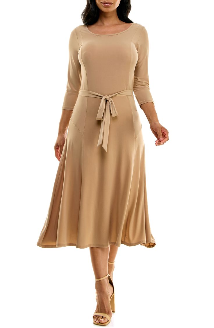 A twirl-worthy, tea-length skirt brings an elegant balance to a solid work-to-weekend dress fashioned from a stretch jersey for a sensible fit. 48" length Bateau neck Three-quarter length sleeves Waist belt 95% polyester, 5% spandex Machine wash, tumble dry Imported Model stats: 5'10" height, 32" bust, 25" waist, 36" hip. Model is wearing size Small. Fit And Flare Midi Dress In Elastane, Flattering A-line Midi Dress In Elastane, A-line Elastane Midi Dress, Stretch A-line Midi Dress For Work, Flattering A-line Midi Dress, Flattering Fit A-line Midi Dress In Elastane, Fit And Flare A-line Midi Dress In Elastane, Flattering A-line Midi Dress With Elastane, Belted Stretch Dresses For Spring