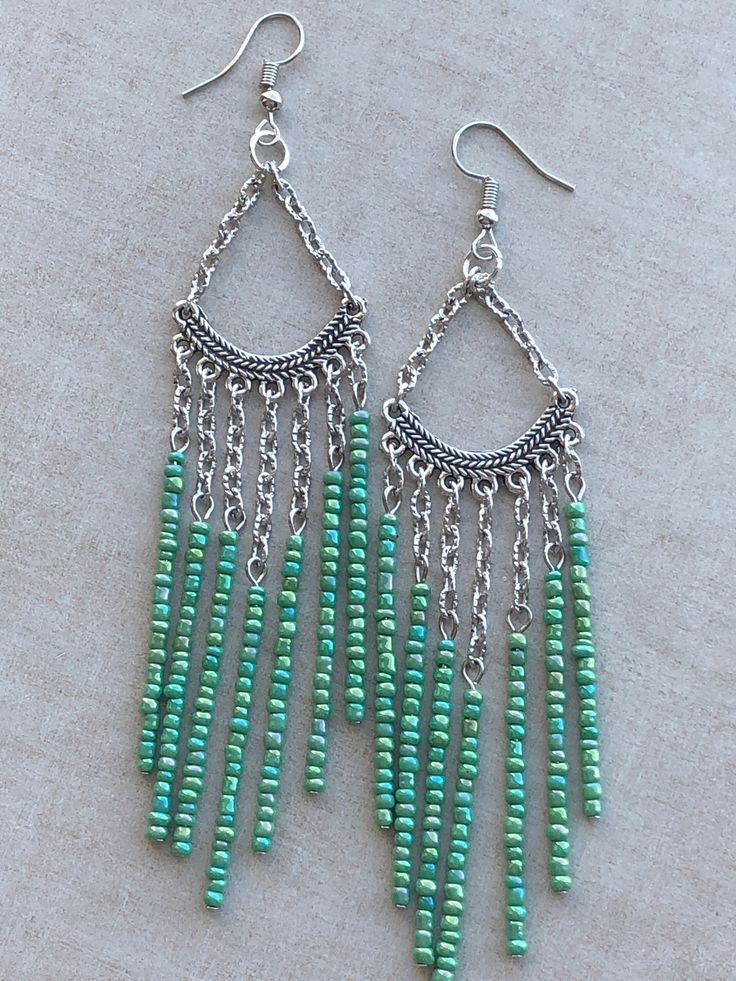 Cheap Green Beaded Earrings For Summer, Metal Beaded Chain Dangle Earrings, Green Dangling Bead Chandelier Earrings, Silver Chandelier Earrings With Colorful Beads, Metal Beaded Dangle Earrings, Bohemian Beaded Chain Dangle Chandelier Earrings, Bohemian Beaded Chandelier Dangle Earrings, Long Drop Chandelier Earrings With Dangling Beads, Wire Earring Ideas