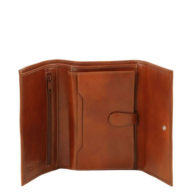 Discover the epitome of sophistication with our finely crafted women's leather wallets italian leather. Each piece is a testament to exquisite Italian craftsmanship, tailored for the modern woman who values both style and functionality.  Our wallets are meticulously handcrafted by skilled Italian artisans using the finest full-grain leather sourced from Italy. The rich texture and durability of the leather ensure a product that not only looks stunning but also stands the test of time.  Inside, t