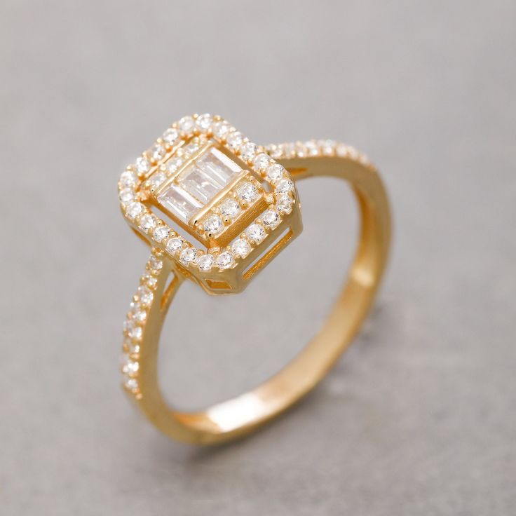 ★14K Solid Gold Baguette Ring, 925 Sterling Silver Baguette Ring, Emerald Cut Stone Ring, Elegant Ring, Valentine's Day Gift, Christmas Gift★ ▷ MATERIAL ★ All of our 10K, 14K, 18K Jewelry are Solid Gold. ( Not Gold Filled or Gold Plated ) ★ All of our silver jewelry is 925 sterling silver and 14 carat gold plated. (Our white silver jewelry is rhodium plated.) ▷ PRODUCTION AND PACKAGING ★ Our jewelry is handmade. It is specially prepared for you in the dimensions you want upon order. ★ We work wi Baguette Cut Halo Diamond Ring Gift, Gold Cluster Ring With Baguette Cut For Gift, Cubic Zirconia Baguette Rings For Gifts, Gold Baguette Cut Cluster Ring For Gift, Gold Baguette Ring As Gift, Halo Baguette Cut Ring For Gift, Yellow Gold Baguette Rings As Gift, Yellow Gold Baguette Rings For Gifts, Baguette Cut Halo Rings For Gift