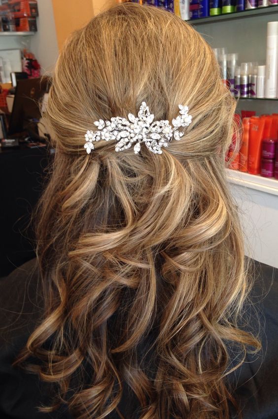 the back of a woman's head wearing a hair comb