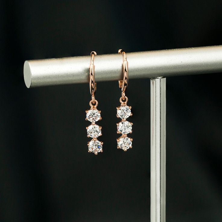 ✥ Elevate your elegance with our Round Cut Three Stone Diamond Dangle Earrings for Women. These exquisite earrings feature a trio of sparkling round cut diamonds elegantly arranged in a dangle setting, adding glamour and sophistication to any look. Crafted from premium materials for durability and lasting shine, they are perfect for special occasions or everyday wear. The dangle design creates movement and catches the light, ensuring attention to detail. A luxurious gift choice symbolizing timel Charles And Colvard Moissanite, Three Stone Diamond, Diamond Dangle Earrings, Jewelry Images, Engagement Ring Wedding Band, Designer Engagement Rings, Moissanite Diamonds, Three Stone, Round Cut Diamond