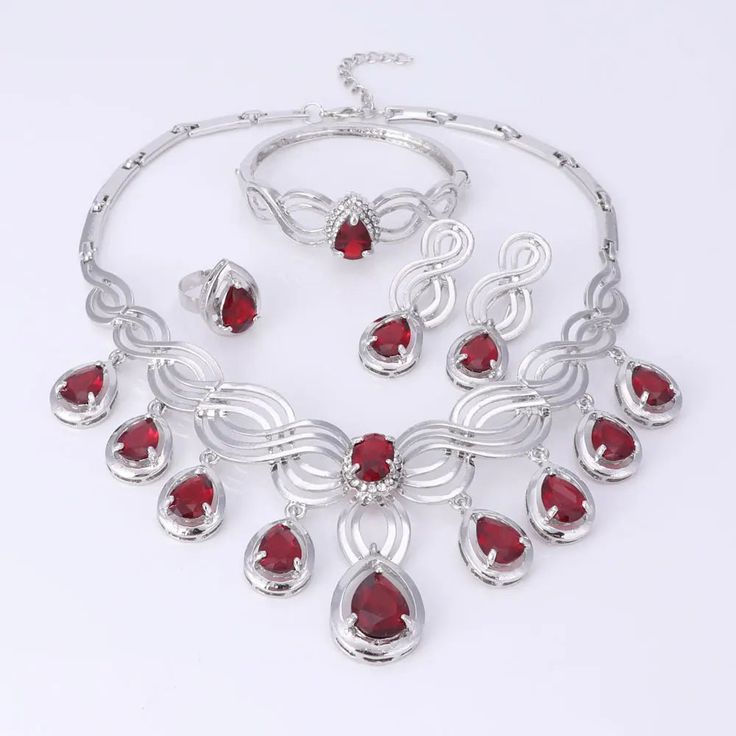 Elegant Crystal Statement Necklace Set Red Alloy Jewelry For Party, Elegant Christmas Formal Jewelry, Red Alloy Jewelry As A Gift, Elegant Christmas Jewelry For Formal Occasions, Red Party Jewelry With Jewels, Elegant Metal Jewelry Sets For Valentine's Day, Christmas Party Jewelry With Cubic Zirconia, Red Metal Jewelry Sets For Party, Elegant Red Metal Jewelry