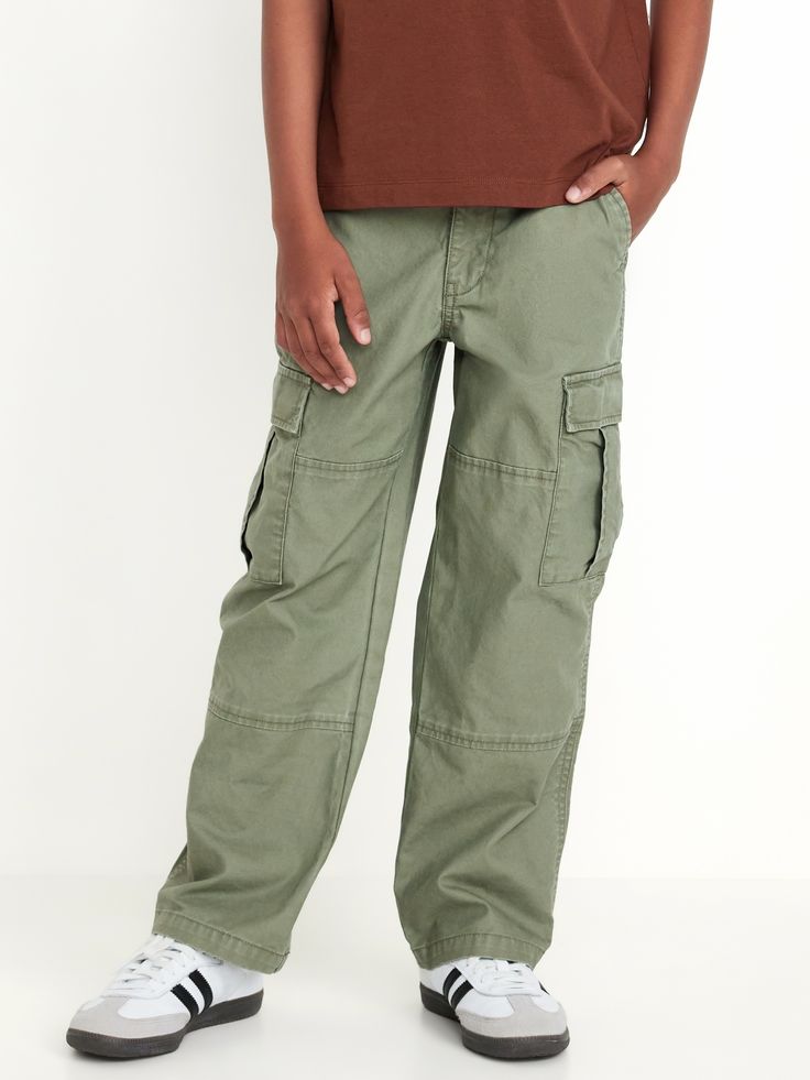 interior adjustable waistband regular button closure zip fly slanted side pockets adhesive secure flap cargo pockets single welt pocket at back sits at waist baggy fit through hip and thigh model is approx.  4’5” and wears size m (8)machine wash according to the care instruction label Green Full-length Cargo Jeans With Patch Pockets, Full-length Cotton Cargo Pants For Outdoor Activities, Full Length Cotton Cargo Pants For Outdoor Activities, Full Length Bottoms With Pockets For Outdoor Activities, Military Cargo Bottoms Full Length, Military Cargo Style Full Length Bottoms, Baggy Full-length Cargo Pants With Patch Pockets, Full-length Military Cargo Bottoms, Military Style Full Length Cargo Jeans