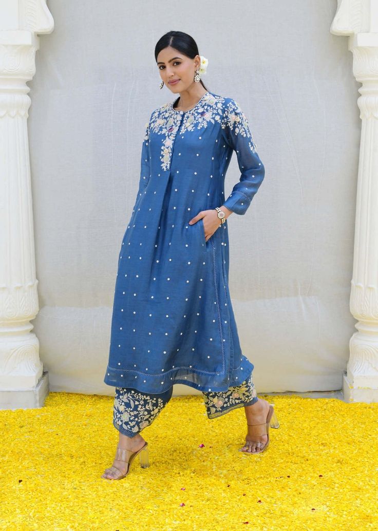 Niti Bothra | Jean Blue Long Kurta And Pants | INDIASPOPUP.COM Floral Embroidery Pant Set For Festivals, Chanderi Pant Set With Floral Embroidery, Designer Festive Pant Set With Floral Embroidery, Mirror Work Pant Set With Straight Kurta, Silk Floor-length Palazzo Set With Floral Embroidery, Silk Pant Set With Straight Kurta And Floral Embroidery, Silk Pant Set With Floral Embroidery And Straight Kurta, Designer Anarkali Pant Set With Floral Embroidery, Bollywood Style Floral Embroidery Pant Set For Eid