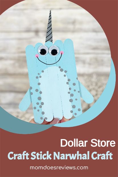 a craft stick narwhale with the words dollar store on it and an image of