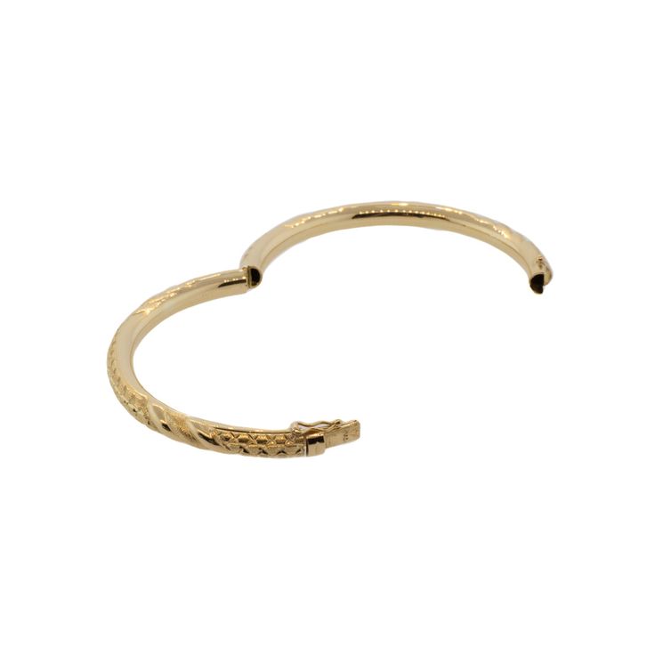 This 18k yellow gold bangle bracelet is hand engraved and features faceted and textured metal. It'll add warmth and sparkle to any look, perfect for any occasion! The inner circumference is 6.75 inches, and opens with a hinge for easy acess. Its is held tightly in place with a security clasp. Hinged 14k Gold Bracelet, Formal Hammered Yellow Gold Cuff Bracelet, Formal Yellow Gold Hammered Cuff Bracelet, Elegant Formal Hammered Bangle, Formal Yellow Gold Hammered Bangle, Tarnish Resistant Cuff Bracelet For Formal Occasions, Formal Tarnish Resistant Cuff Bracelet, Formal Tarnish-resistant Cuff Bracelet, Luxury Hammered Bangle Bracelet