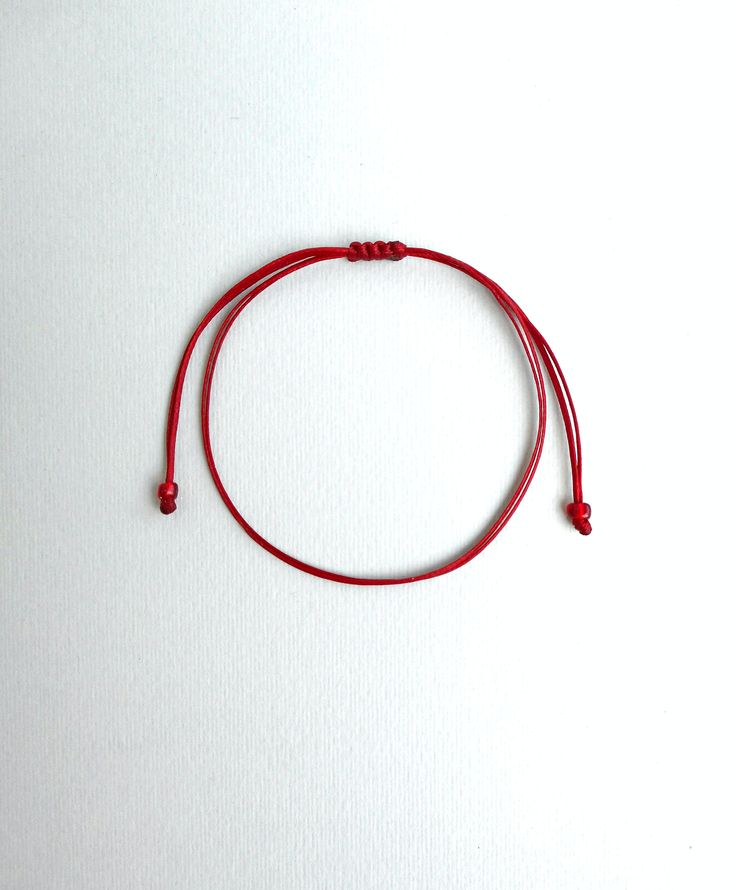 Dark red string ,Red string bracelet, String bracelet, Red string of fate, Minimal bracelet, Lucky bracelet, Good luck bracelet, Simplicity This bracelet is made of two dark red waxed strings and has dark red glass beads at ends. It is adjustable to fit all sizes. *Colours may differ slightly from the original due to the configuration of your computer. *There may be light variations on colour and size. *Items appear larger on your monitor than actual size. Red Adjustable Bracelets For Everyday, Adjustable Red Bracelets For Everyday, Red Resizable Friendship Bracelets For Everyday, Casual Red Braided Bracelets, Red Adjustable Cord Jewelry For Friendship, Red Adjustable Cord Friendship Jewelry, Red Adjustable Friendship Jewelry, Red Waxed Cord Bracelet With Sliding Knot, Red Adjustable Cord Bracelets