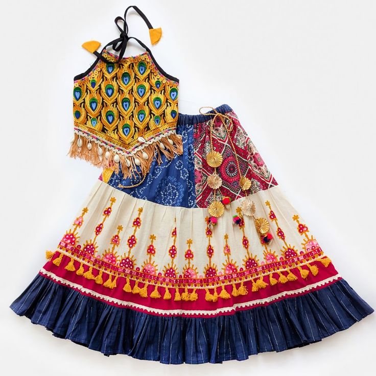 🦚Morpankh Multicolour Chaniya Choli for Girls🦚 Intricate embroidery, multiple fabrics, laces, latkans, jhallar, strings, kodis, tassels, together make this harmony beautiful. Available on halemons.com #Ghoomar3Collection #BabyGirlFashion #KidsEthnicWear #GirlsEthnicWear #FestivalCollection #KidsClothingBrand #KidsClothing #GirlsFashion #Navratri2024 #LehengaCholi #NavratriOutfit #KidsWear #IndianOutfit Navratri Chaniya Choli For Girl Kids, Chaniya Choli For Kids, Lehenga Choli For Navratri, Choli Pattern, Chania Choli, Chaniya Choli Designs, Kids Party Wear Dresses, Kids Ethnic Wear, Navratri Dress