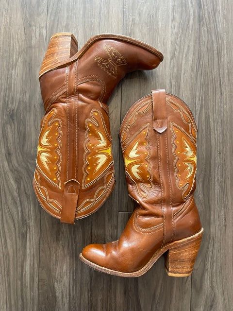 Excellent vintage condition Stacked heelAll leather Gold butterfly detail 1970’s Size 5-6 Brown Western Boots With Block Heel, Vintage Pointed Toe Boots For Fall, Retro Medium Width High Heel Boots, Retro Boots With Stacked Heel For Fall, Retro High Heel Boots Medium Width, Retro Stacked Heel Boots For Fall, Retro Fall Boots With Stacked Heel, Retro Leather Boots With Reinforced Heel, Retro Brown Pointed Toe Boots