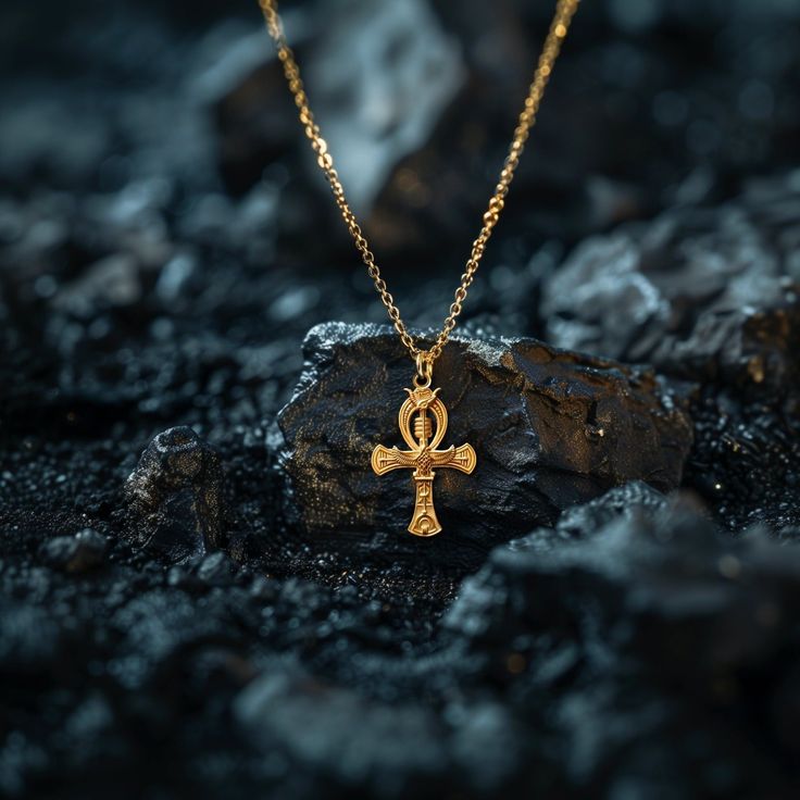 This solid gold key of Ankh necklace showcases exquisite craftsmanship, symbolizing life and spirituality. The key of Ankh pendant is more than just jewelry; it's a fine representation of ancient Egyptian elegance and the timeless allure of this sacred symbol. PENDANT INFORMATIONThis pendant is made of real, solid gold.• Made in USA• Material: 14k or 18k solid gold• Finish: polished• Height: 1.5" (38,5 mm) x Width: 0.95" (24 mm)• Pendant weight: approx. 5 grams (14k)• Bail: fits up to 4 mm chain Egyptian Heritage, Eternal Symbol, Ankh Pendant, Symbol Of Life, Ankh Necklace, Gold Key, Sacred Symbols, Metal Works, Life Symbol