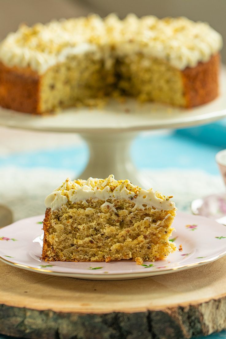 a piece of cake sitting on top of a plate next to a slice of cake